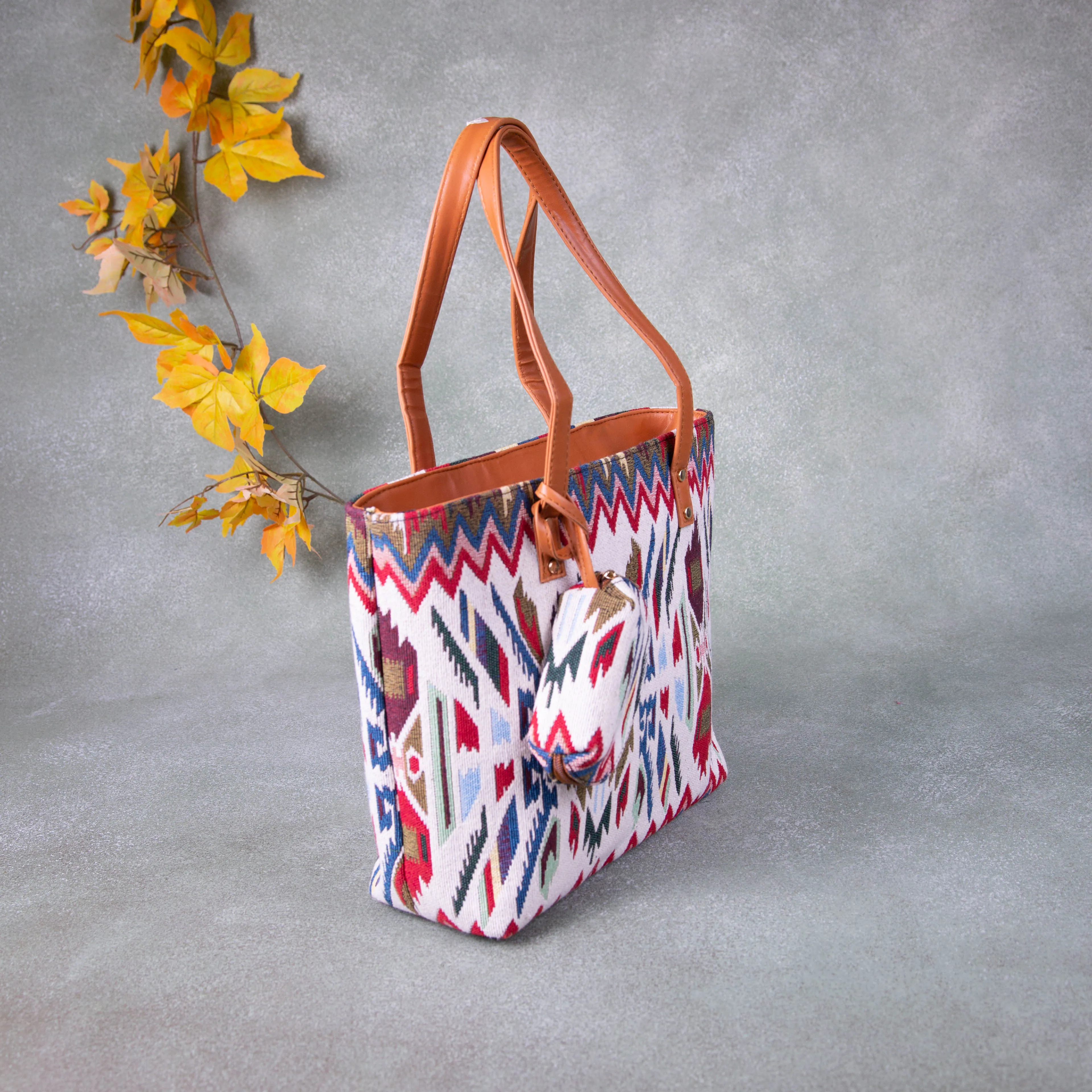 Double Zippered Tote White with Red Zig Zag Design.