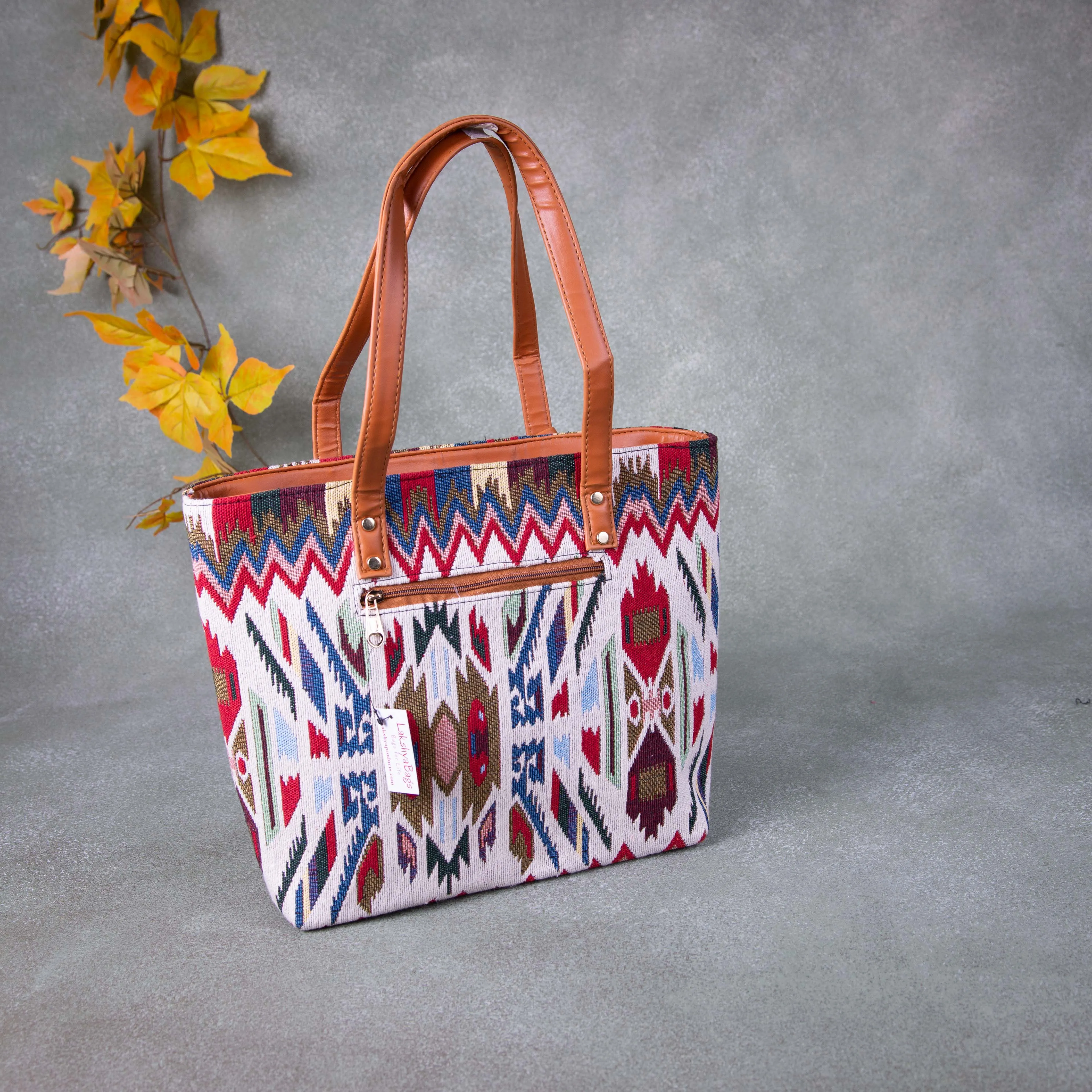 Double Zippered Tote White with Red Zig Zag Design.