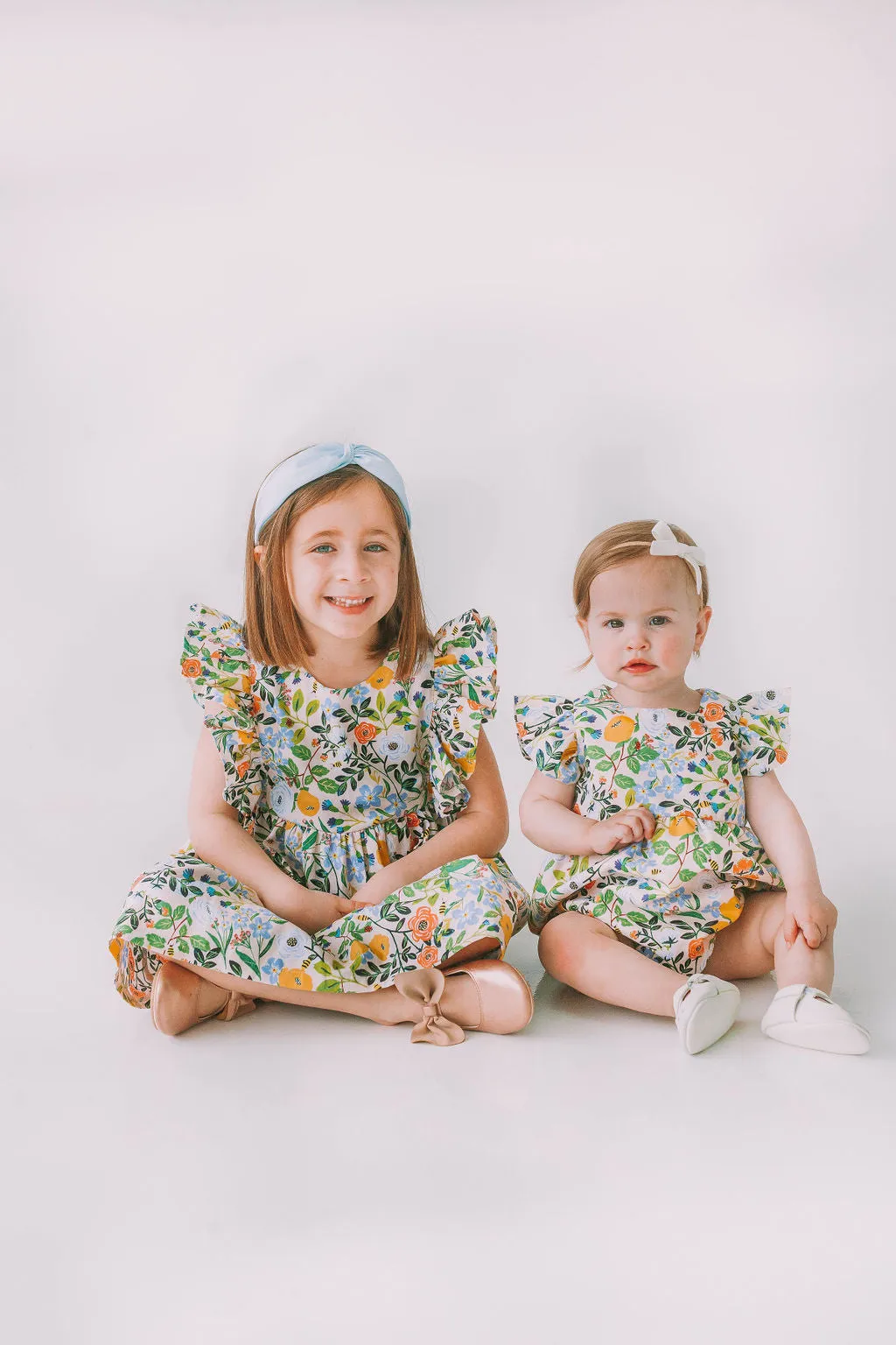 Infant Girl's Orange Blue and Green Botanical Floral Bubble Romper