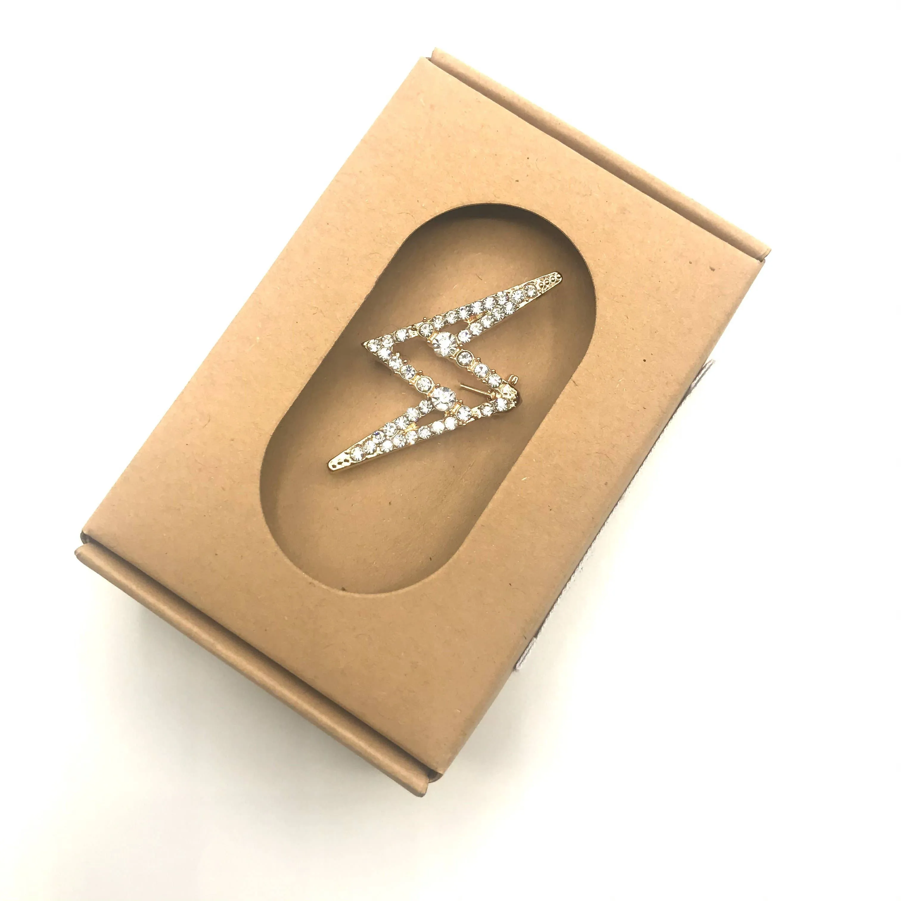 Sixton Bejewelled Lightning Bolt Pin / brooch