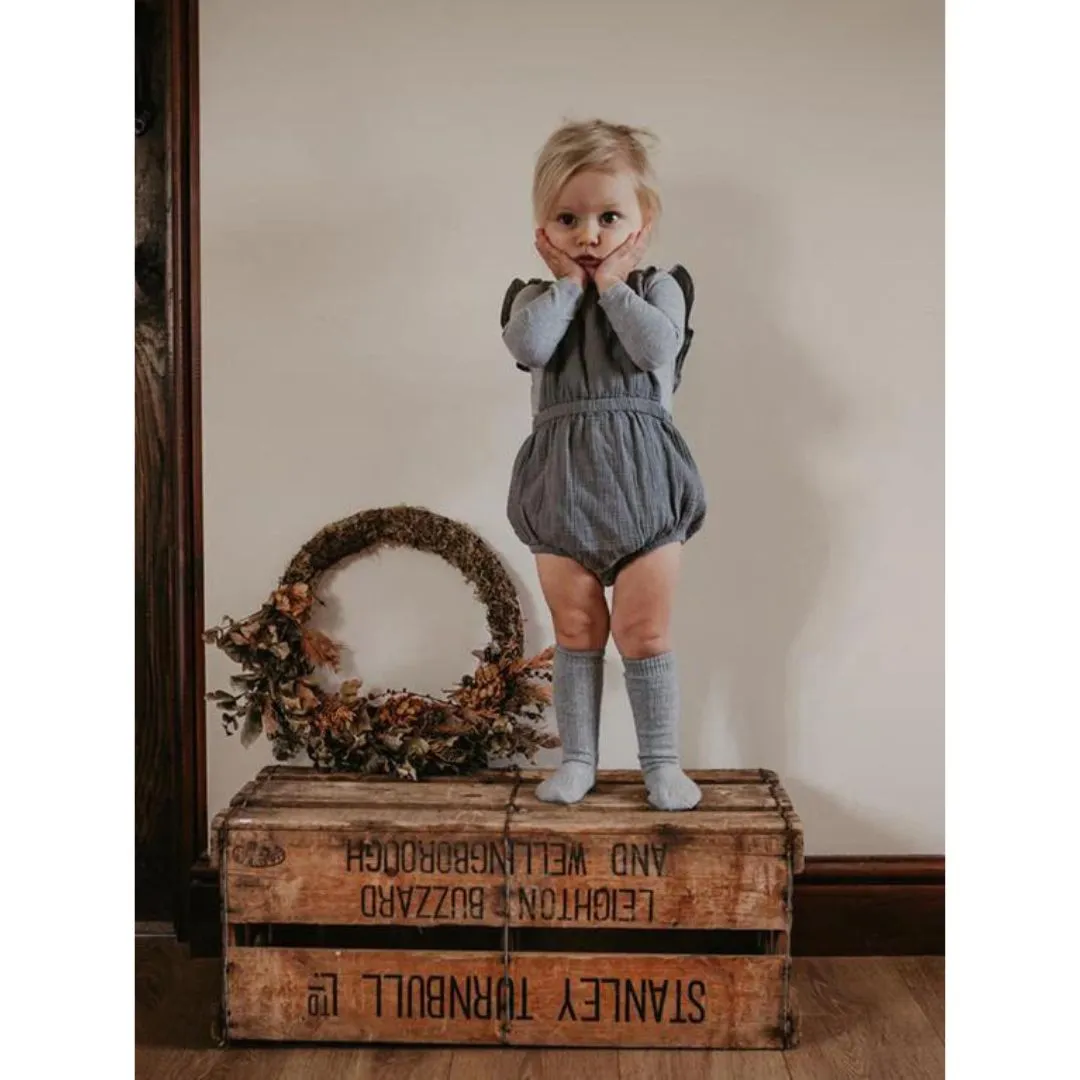 The Simple Folk: The Ruffle Romper - Lead Grey